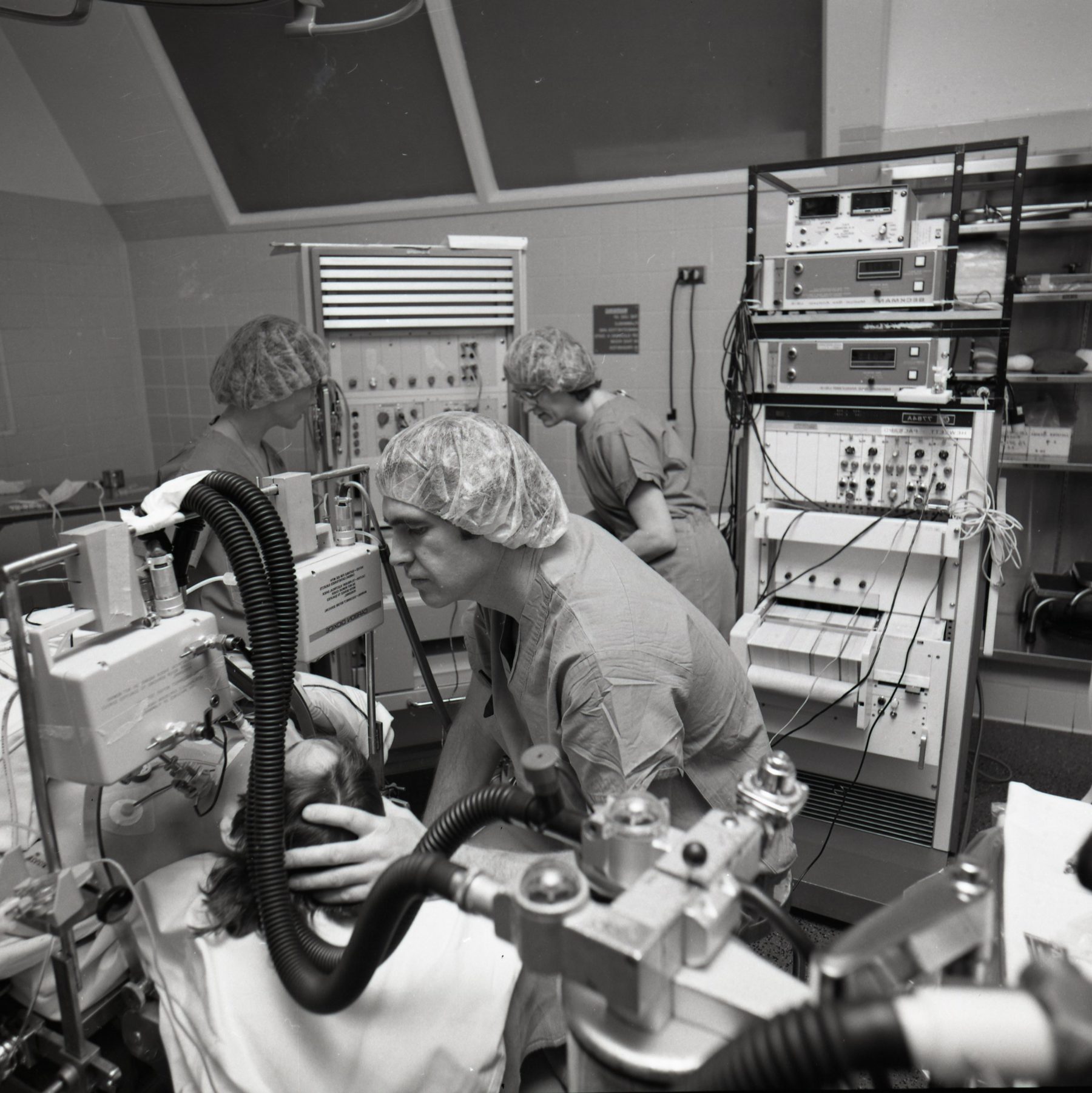 Doctor examining a patient during a medical procedure