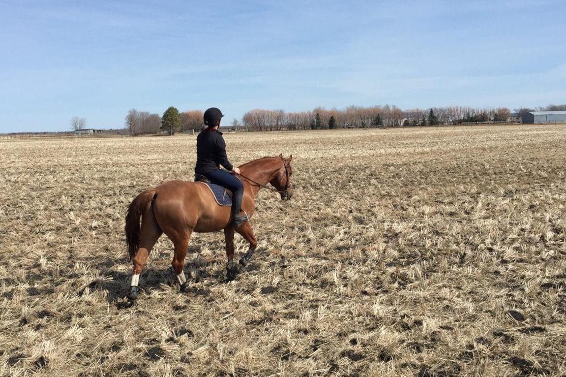 Rebecca Fentum-Jones riding a horse post accident
