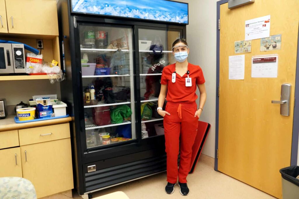 Double-wide sliding door refrigerator.
