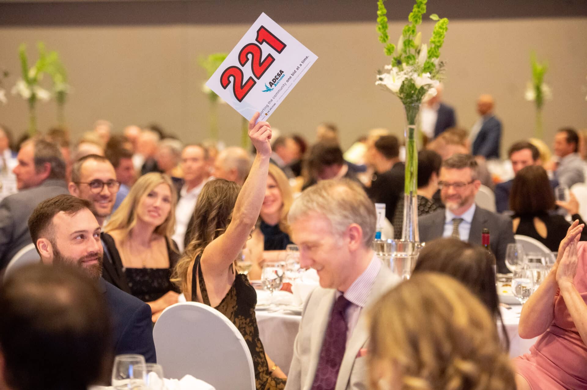 Guests bidding for prizes at Savour Ireland
