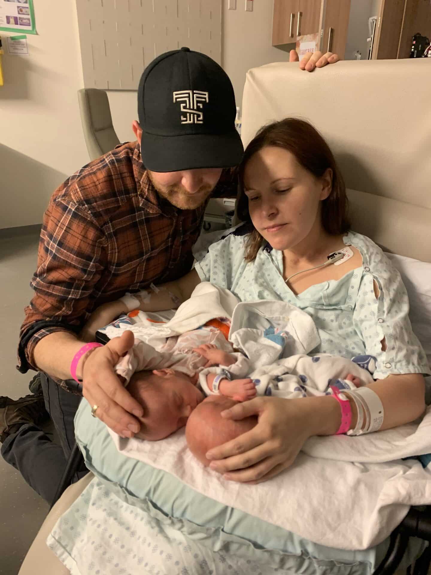 Jenn Schappert with her husband and their newborn twins Saoirse and Sawyer.