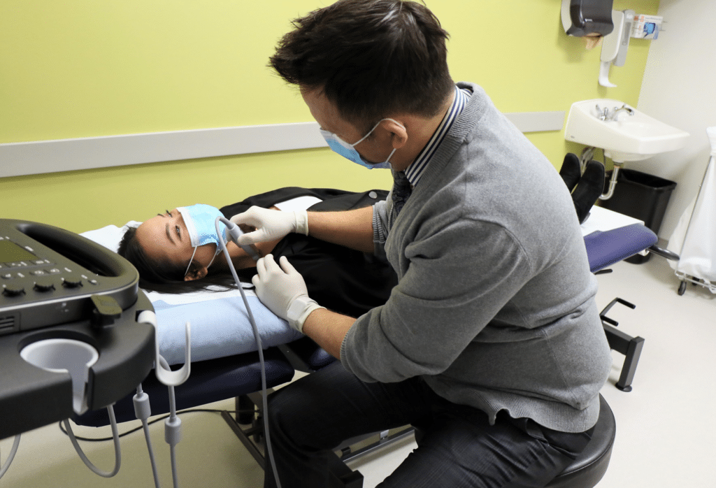 Dr. Ryan Amadeo and a patient